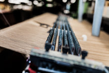 Load image into Gallery viewer, Weaving Thread into Fabric